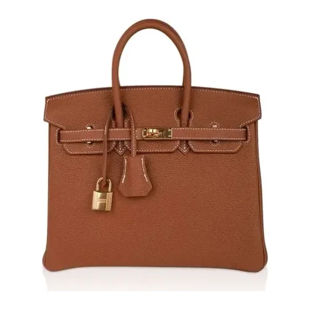 Brown leather handbag with top handles and gold-tone hardware